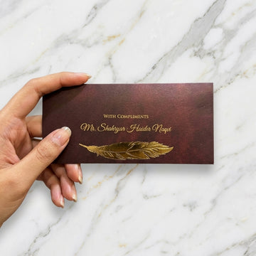 Maroon Envelope With Gold Feather